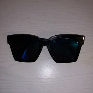black framed light blue shades